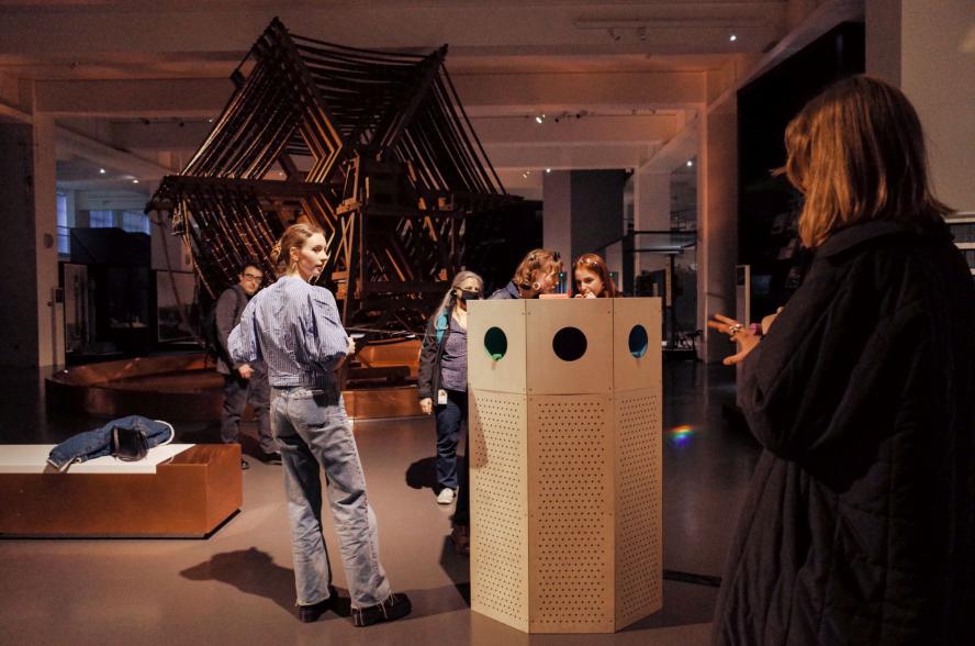 Students work on installing an interactive sculpture in London’s Science Museum