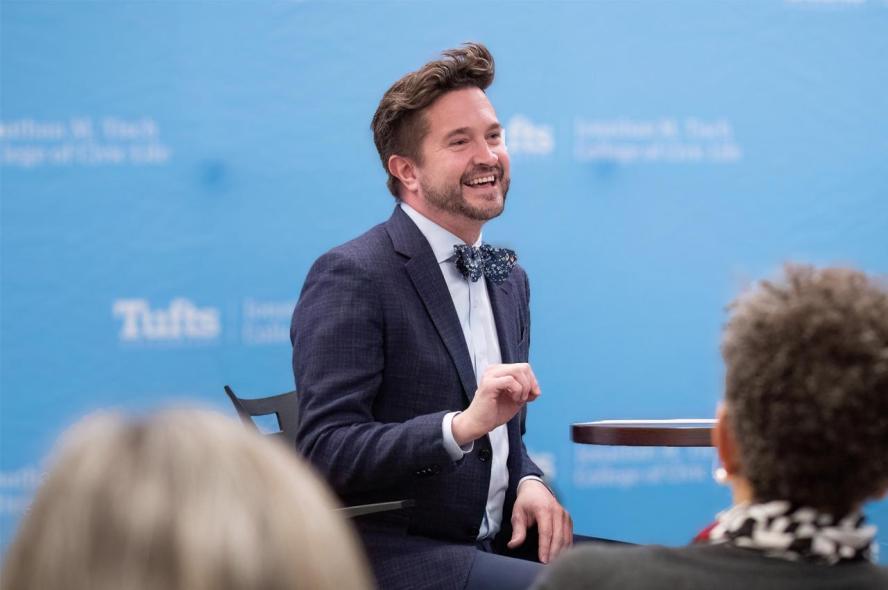 Physician Mitchell Lunn speaks at a Tufts event. 