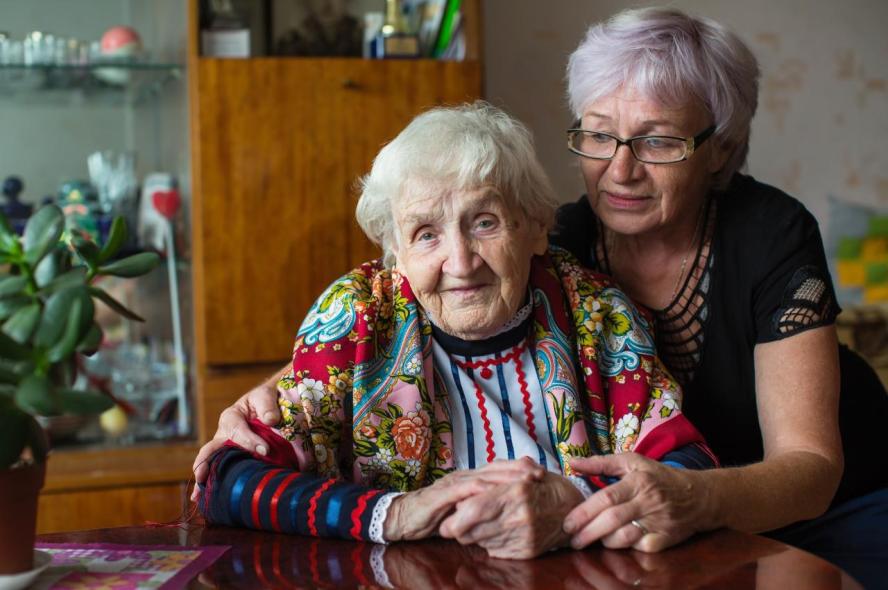 A centenarian woman and her adult daughter