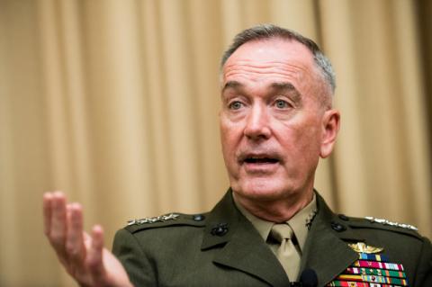 Joseph Dunford speaking and gesturing in military attire