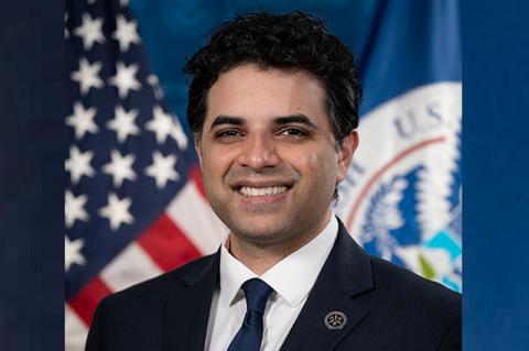 A man poses for a formal portrait in front of the American flag. Pritesh Gandhi, A04, M11, MG11 (MPH) was appointed chief medical officer for the Department of Homeland Security by President Joe Biden.
