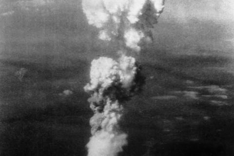 A mushroom cloud rises over Hiroshima, Japan after it was attacked with an atomic bomb. As the number of atomic weapons worldwide grows, the best way to honor history is not to repeat it, an expert argues