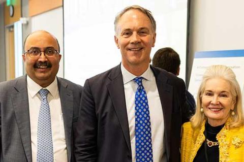 A photo of Tufts University President Sunil Kumar, New Bedford Mayor Jon Mitchell, and Deborah Wince-Smith, Council on Competitiveness president and CEO 