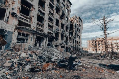 A large building mostly destroyed by bombing. 