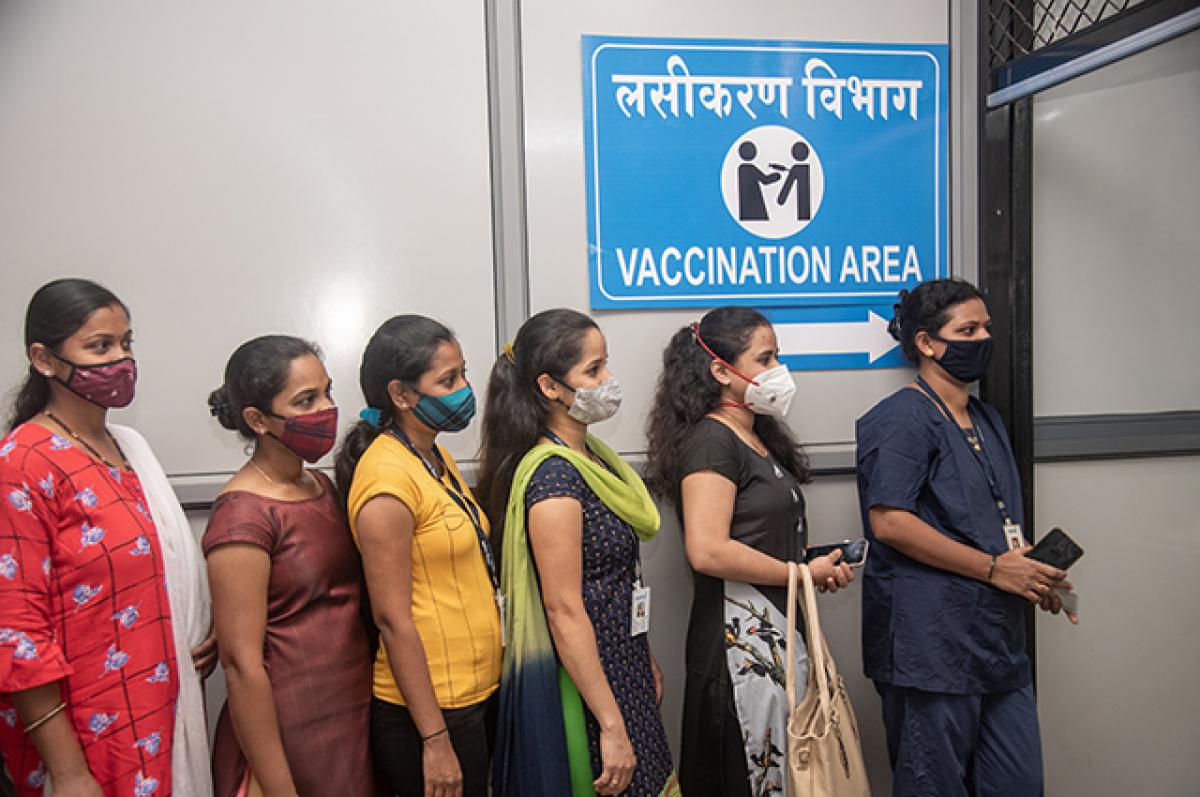 A Problem That Stands Between Us and the End of the Pandemic Police and health care workers line up to register for the COVID-19 vaccine at a hospital in Mumbai, India. Vaccine nationalism threatens to delay the end of the pandemic.