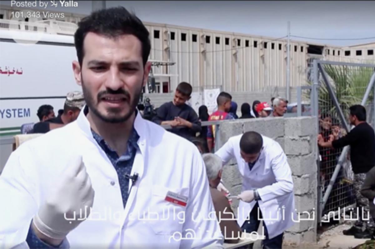 From Baghdad to Boston: Dental Student’s Journey Is About Healing and Building Bridges Modar Bilind Al-Roomi, DI21, a founder of the Kurdish Dental Health Organization, gives an interview in April 2016 for the Arabic social media platform Yalla at a refugee camp in Irbil, Iraq. Photo: Courtesy of Modar Bilind Al-Roomi