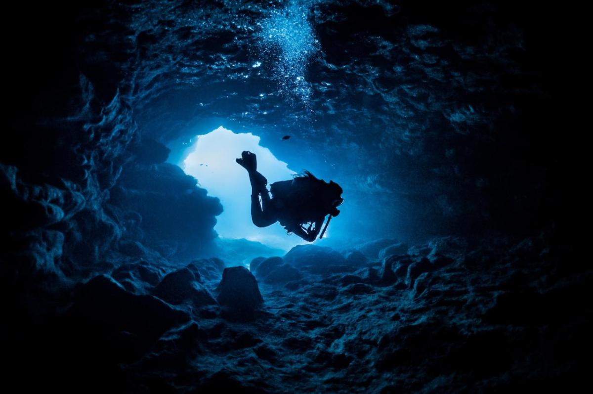 a diver in a cave